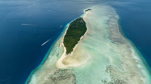 Tropical island Mataking with coral reef and atoll view from above. Tun Sakaran Marine Park. Borneo, Sabah, Malaysia.