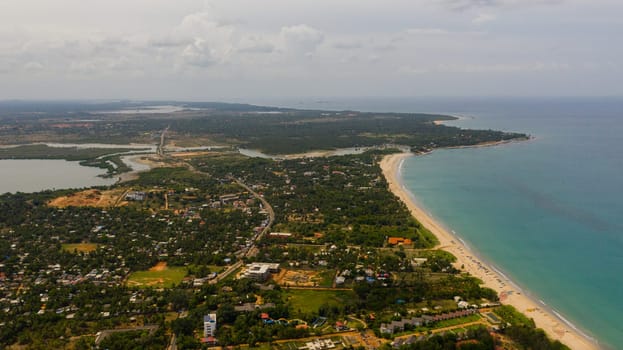 City beach and hotels on the shore of the resort town of Trincomalee.