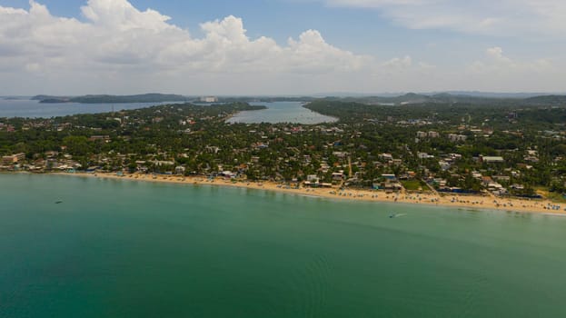 Aerial drone of Trincomalee Town, coastal resort city. Panoramic Top View on beach in Trincomalee, Sri Lanka.