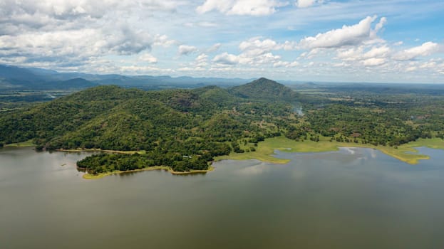 Top view of lake and valley with tropical forest. Sorabora lake, Sri Lanka.
