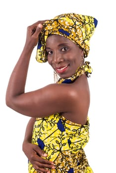 African woman in yellow loincloth posing happily isolated on white background