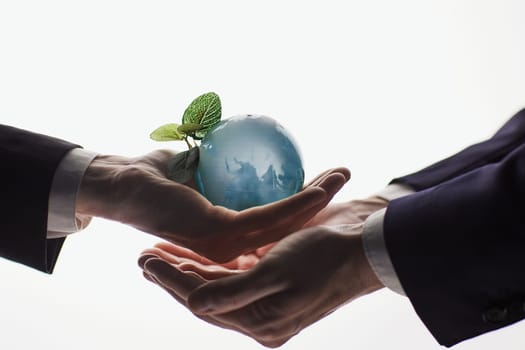 earth in hands. Glass World, on a white background