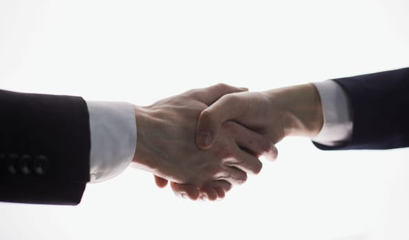 Two businessmen shake hands for agreement. Isolated image with white background, Business concept