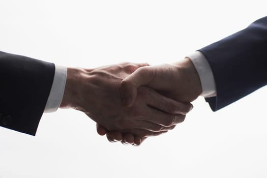 Two businessmen shake hands for agreement. Isolated image with white background, Business concept