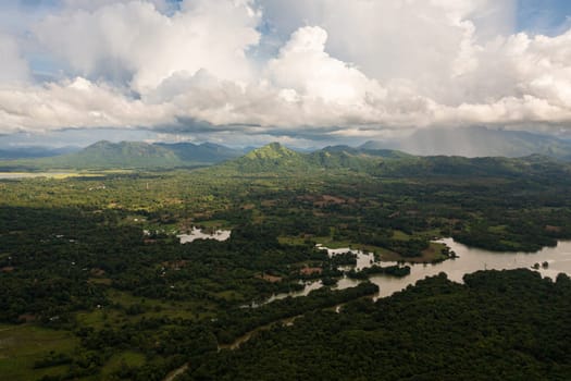 Aerial view of Tropical mountain range and mountain slopes with rainforest. Sri Lanka.