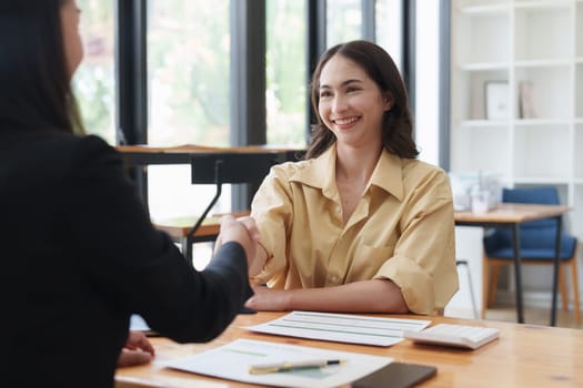 Business people handshake. Successful businessmen handshaking after good deal. Finishing up meeting concept.