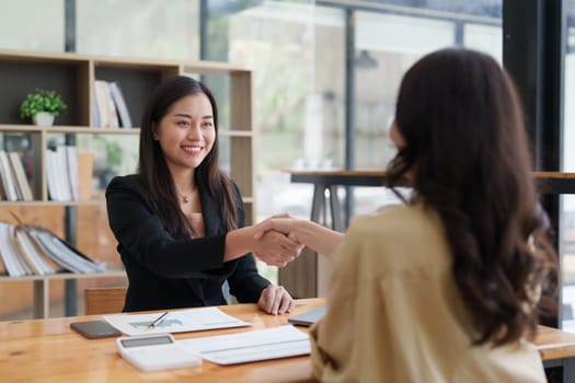 Business people handshake. Successful businessmen handshaking after good deal. Finishing up meeting concept.
