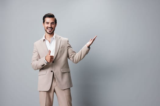 man handsome businessman posing standing background suit portrait occupation success beige sexy copyspace business happy guy tie shirt job smiling young