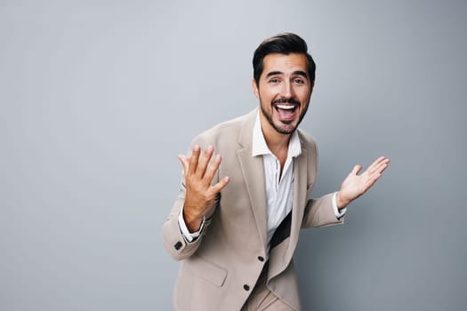 man happy shirt posing male victory stylish winner sexy attractive office background formal suit arm businessman young business smiling hand beige