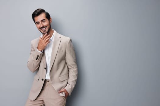 man office businessman stylish sexy professional job beige studio smiling shirt handsome posing portrait business happy tie folded copyspace model suit