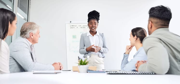 Presentation, black woman speaker and team in business meeting, market research and economy strategy workshop. People at training seminar, leadership and brainstorming collaboration at finance firm.