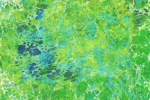 Colorful abstract pattern. Painted background in the colors yellow, green and blue