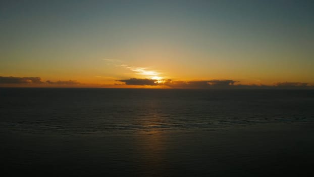 Colorful sunrise over sea, top view. Sunrise over ocean. Philippines