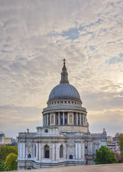 Detail photo of St Paul's Cathedral in London, evening clouds - space for text - above.