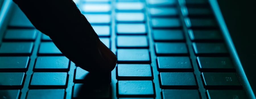 Close-up of hands typing on a computer keyboard. Keyboard closeup view.Keyboard closeup view.