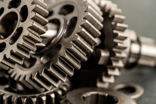 Gear and cogs wheels, clock mechanism, brass metal engine industrial.