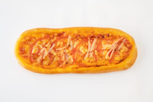 Little mini pizza with ham and cheese on a white