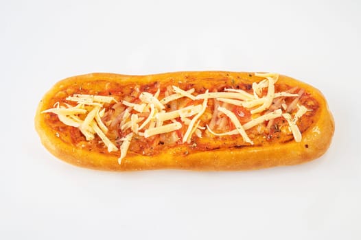 Little mini pizza with ham and cheese on a white