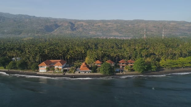 aerial seascape luxury hotel on beach background mountainss in tropical resort. Bali,Indonesia, travel concept.