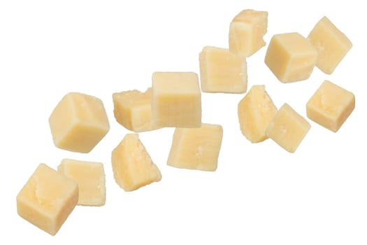 Pieces of hard parmesan cheese isolated on white background. Pieces of square-shaped parmesan on a white background, close-up. Italian variety of hard cheese, long maturation