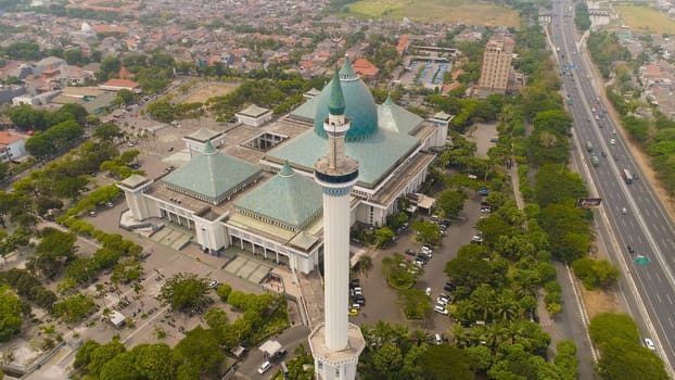 aerial view mosque in Indonesia Al Akbar in Surabaya, Indonesia. beautiful mosque with minarets on island Java Indonesia. mosque in an asian city