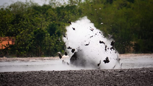 mud volcano with bursting bubble bledug kuwu. volcanic plateau with geothermal activity and geysers, slow motion Indonesia java. volcanic landscape