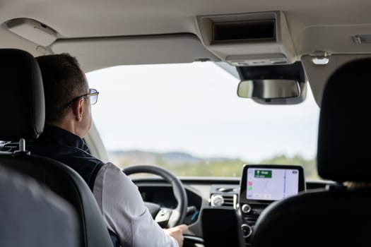 man driving car with the help of navigation. High quality photo