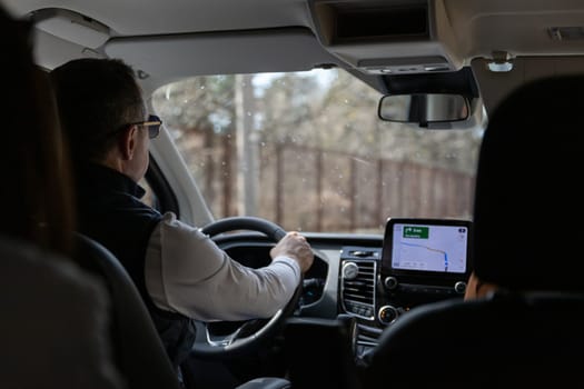 man driving car with the help of navigation. High quality photo