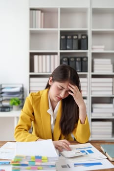 Deadline with young business woman feeling stressed concept. Business woman working at office, business finance concept.