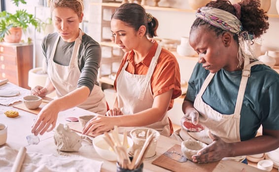 Pottery class, ceramic workshop or group design sculpture mold, clay manufacturing or art product. Diversity people, retail sales store or startup small business owner, artist or studio women molding.