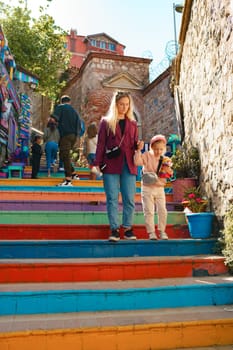 Mother and daughter on a walk in Balat district of Istanbul, Turkey