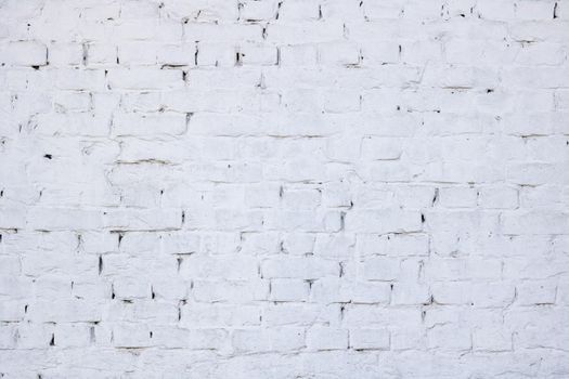 Brick wall painted white close up, background or texture