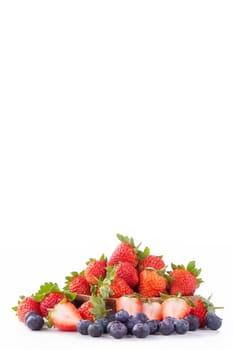 A bowl set of beautiful and delicious strawberry and blueberry isolated on white background, close up, copy space, clipping path, cut out.