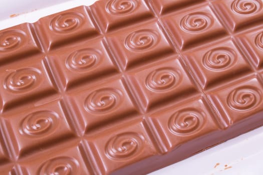 BELARUS, NOVOPOLOTSK - 20 DECEMBER, 2020: Open Milka chocolate close up
