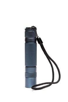 Big blue flashlight isolated on a white background
