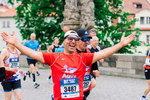 Prague, Czechia - 7th May 2023 - Runners of Prague Half marathon in the city streets.