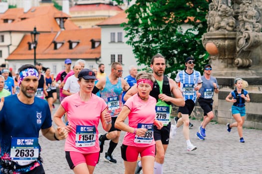 Prague, Czechia - 7th May 2023 - Runners of Prague Half marathon in the city streets.