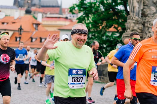 Prague, Czechia - 7th May 2023 - Runners of Prague Half marathon in the city streets.