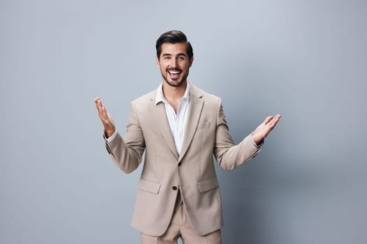 man arm winner business white hand attractive confident happy posing young isolated celebrate sexy beige businessman person job suit victory copyspace