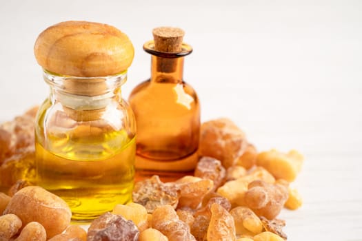 Frankincense or olibanum aromatic resin isolated on white background used in incense and perfumes.