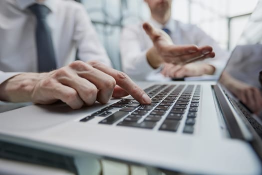 Single finger press button on laptop keyboard