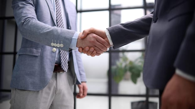 closeup shot of businessmen shaking hands