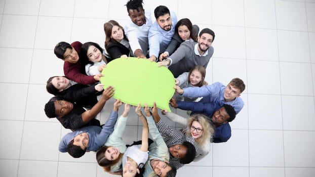 businessmen holding blank speech bubble above their heads. View from above