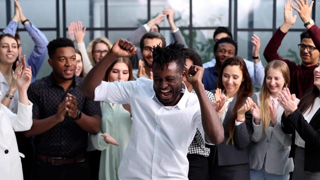Portrait of business and advertising team, laughing and clapping