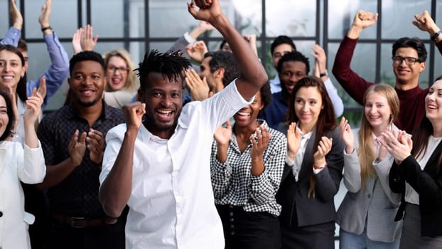 Portrait of business and advertising team, laughing and clapping