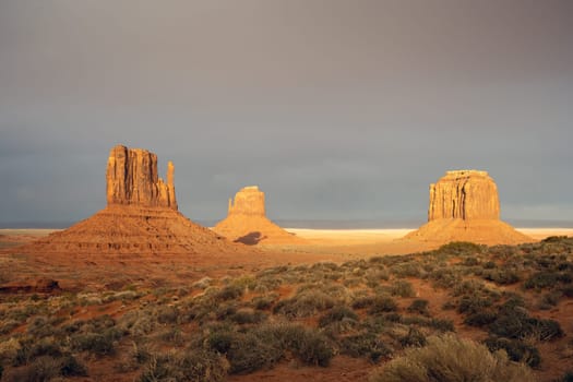 The famous Monument Valley in the USA with dark strom clouds