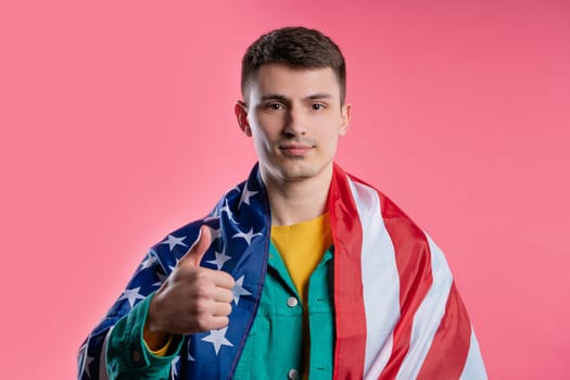 Happy man with national USA flag on violet background. American patriot, 4th of July - Independence day celebration, election, America, labor. US banner. High quality