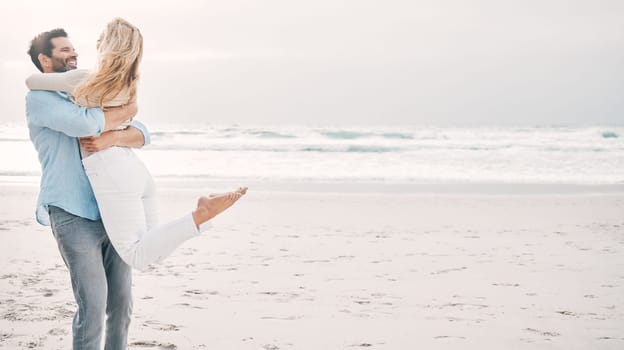 Beach, travel and man carry woman on holiday, vacation and romantic weekend for anniversary. Mockup space, marriage and happy mature couple spin in air for bonding, quality time and romance by ocean.