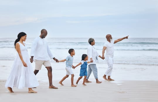 Family walk on beach sand, holding hands and generations, tropical vacation in Mexico, travel and trust outdoor. Grandparents, parents and kids, happy people with adventure and tourism with sea view.