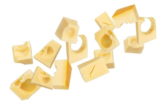 Pieces of emmental cheese on a white isolated background. Pieces fly off in all directions. To be inserted into a design or project. High quality photo